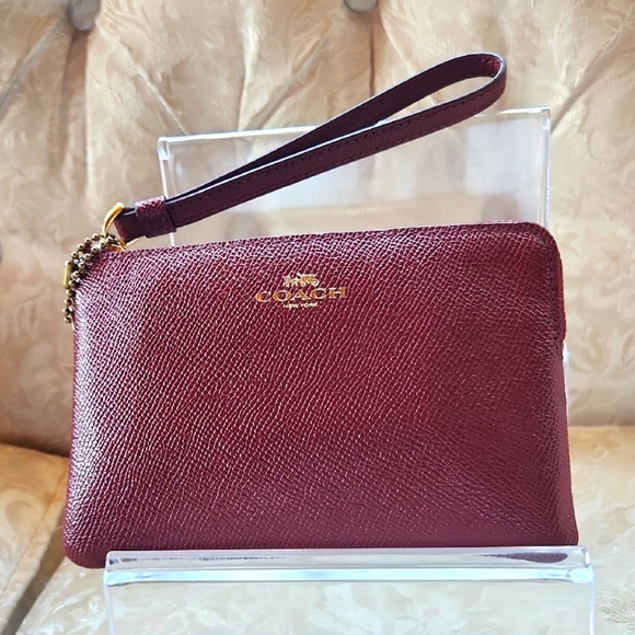 Coach Burgundy Wristlet with Gold Accents - Picture 1 of 3